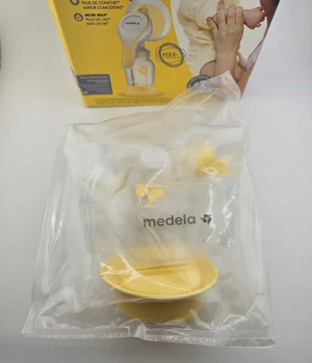 Extractor de leche manual Medela Harmony CAJA ABIERTA sin usar sellado. Foto 1 de 4
