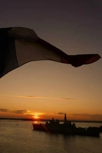 Sun Setting on a Royal Navy ship in The Solent Hampshire England UK Photograph - Picture 1 of 1