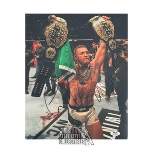 Conor McGregor Autographed 11x14 UFC Photo - PSA/DNA (Belts) - Picture 1 of 1