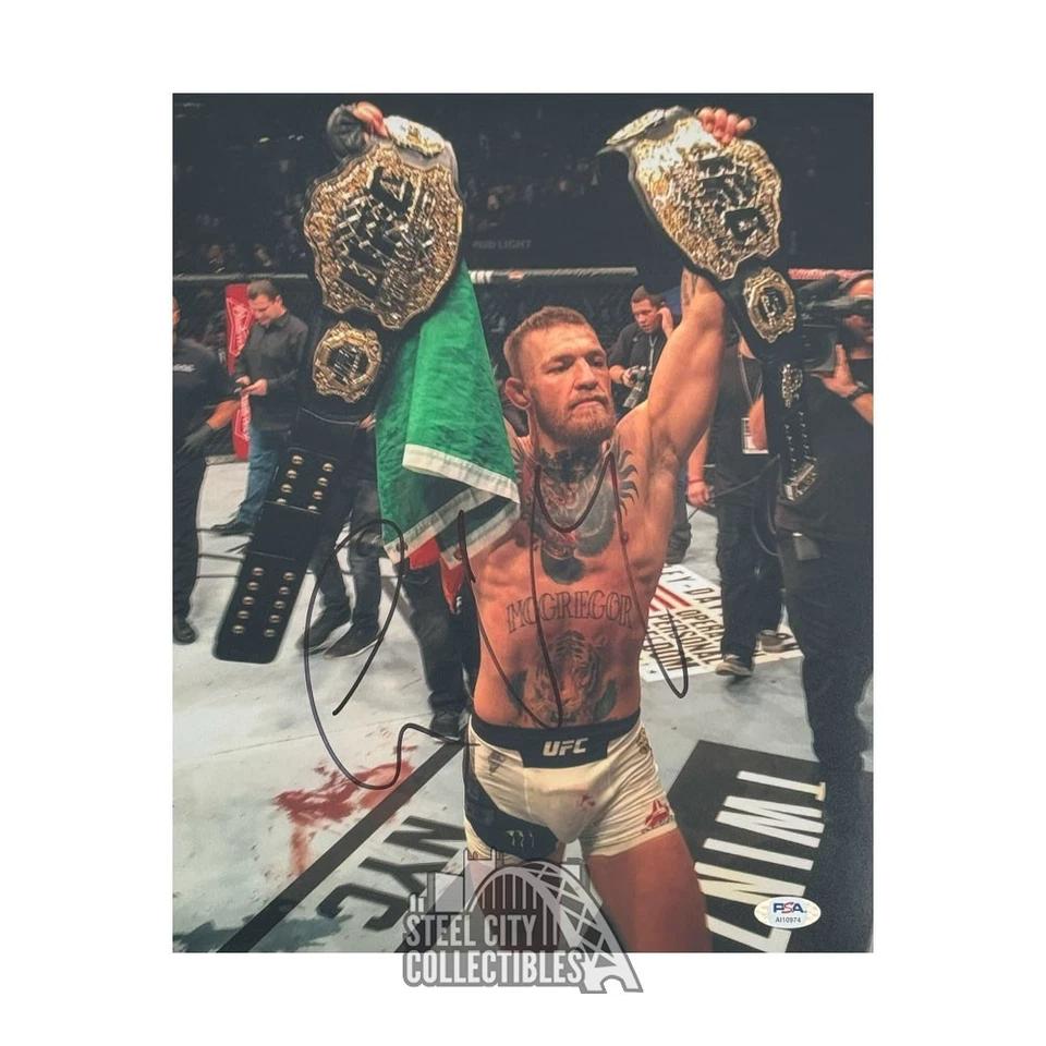 Conor McGregor Autographed 11x14 UFC Photo - PSA/DNA (Belts) - Image 1 of 1