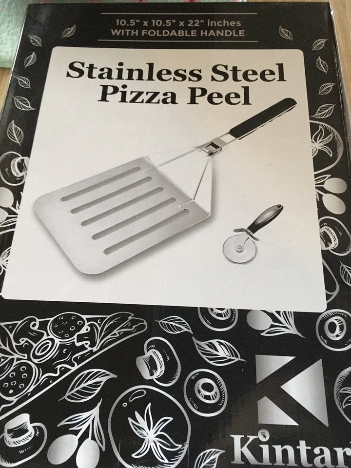 Cáscara de pizza extra grande de acero inoxidable de 22 pulgadas con cortador de pizza Foto 1 de 1