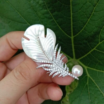 Natural White Sea Shell Mop Carved Leather Shape Cz Pave White Pearl Brooch - Image 1 of 4