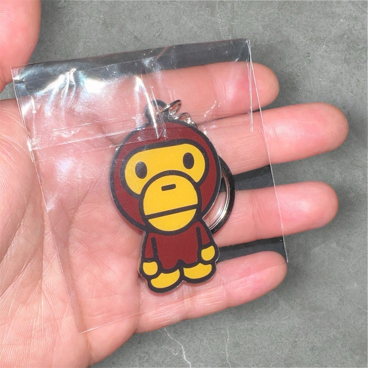キーホルダー・キーリング BAPE Bathing Ape Head Faux Fur Keychain Brown A BATHING APE（アベイシングエイプ）の「APE HEAD FAUX FUR