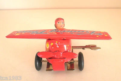 Juguete de hojalata de cuerda vintage de avión de entrenamiento/China, nuevo en caja, nuevo/en caja Foto 1 de 4