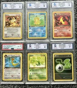 1st Ed Rocket 2000 Pokemon Card Meowth Psyduck Rapidash Dragonite Oddish Graded - Picture 1 of 7