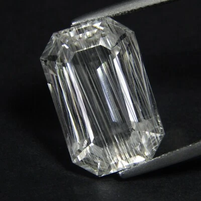 Piedra preciosa Brasil corte esmeralda topacio blanco rutilado natural brillante de 18,15 quilates Foto 1 de 4