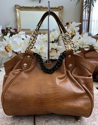 BOLSO SHOPPER HENRI BENDEL MILLINER COCODRILO CUERO MARRÓN EN RELIEVE ¡USADO EN EXCELENTE ESTADO! Precio de venta sugerido por el fabricante $550 Foto 1 de 4