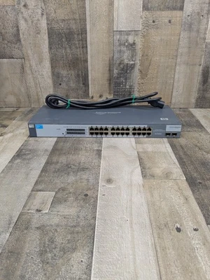 Conmutador HP ProCurve 1700-24 J9080A puertos 10/100Base-TX (1-22)  Foto 1 de 4