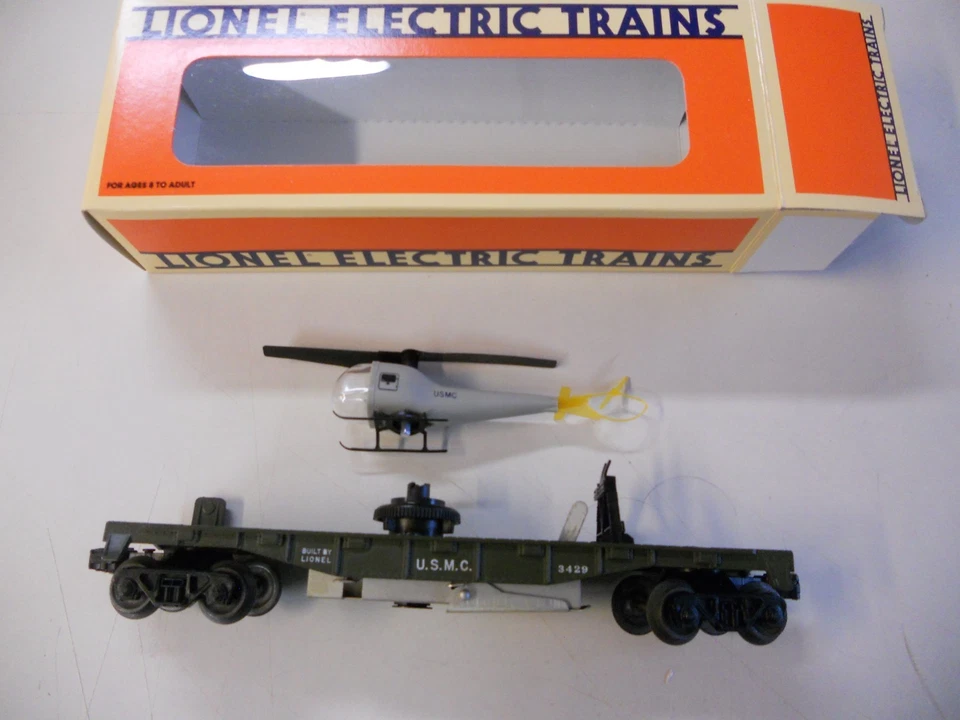 Lionel 3429 USMC Lauching Helicopter Car w/USMC copter, repo box, instr "RARE" - Image 1 of 4