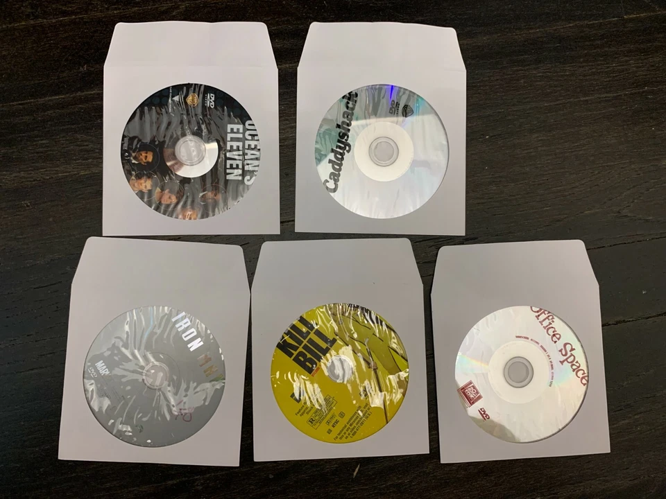 5 classic DVDs Office Space, Iron Man, Ocean's Eleven, Caddyshack & Kill Bill Foto 1 de 1