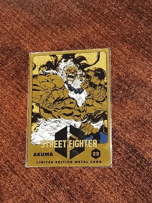 Akuma Gold Metal Card 22 - Street Fighter 6 - UDON Entertainment - SDCC 2025 - Image 1 of 4