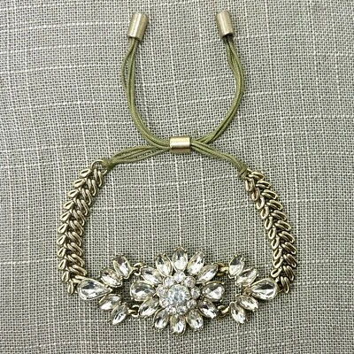 GoldTone Sage Green Cord Slide Bracelet Crystal Flower Adjustable Size 6.25 & Up - Image 1 of 4