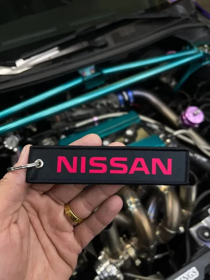 Nissan logo Jet Tag keytag Foto 1 de 1