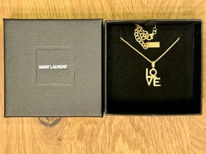 Saint Laurent LOVE Necklace Gold Tone Love Pendant Charm & Chain w YSL Tag & Box - Picture 1 of 18