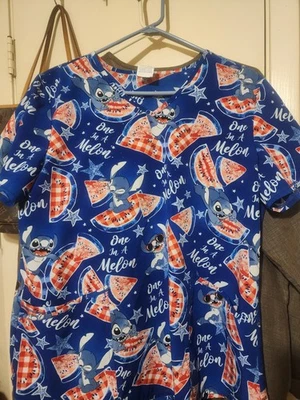 Disney Stitch blue/red Character Scrubs Top (L) - Image 1 of 4