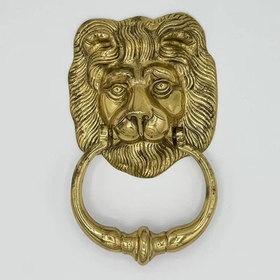 Llamador de puerta con cabeza de león de latón vintage 7’ de largo 4,25’ de ancho Foto 1 de 2