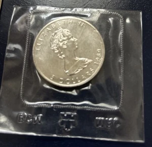 1989 Canadian Maple Leaf Elizabeth II $5 Dollar 1 oz Silver Coin Unc Sealed - Picture 1 of 3