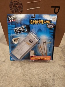 Raro WWF Smackdown Grapple Gear Hardcore Recovery JAKKS Pacific Set WWE NOS - Imagen 1 de 4