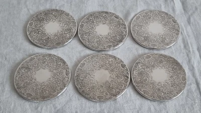 Juego de 6 posavasos plateados de excelente calidad con patrón perseguido - Barker Ellis Foto 1 de 4