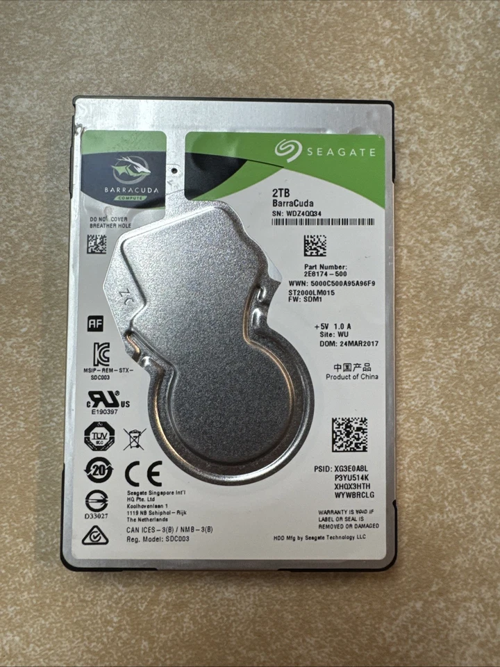 ST2000LM015, WDZ, WU, PN 2E8174-500, FW SDM1, Seagate 2TB SATA 2.5 HDD - Image 1 of 2