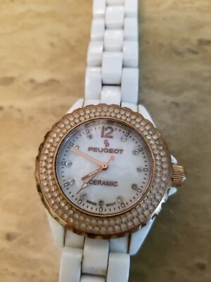 Reloj Mujer Vintage Peugeot Cuarzo Cerámica Suiza Swarovski Cristal Bisel Blanco Foto 1 de 4
