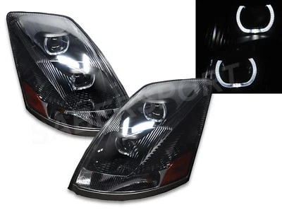 Juego de pares de faros proyectores negros con llantas halo para Volvo VNX VNL 2004-2017 Foto 1 de 4