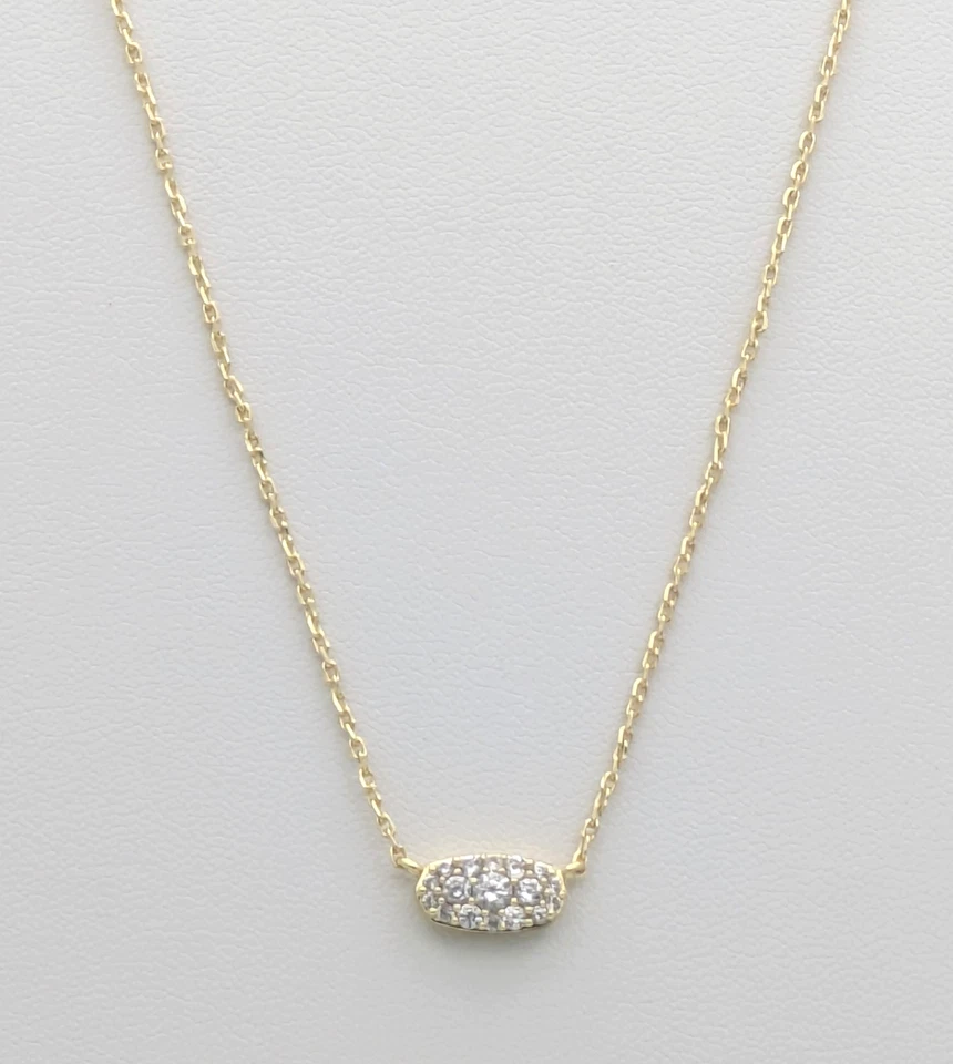 Ajuste Kendra Scott. Collar colgante pavé chapado en oro en cristal blanco con DB Foto 1 de 4