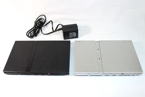 (2) Sony PlayStation 2 Silver Slim SCPH-79001 & Black PS2 SCPH-75001, Powers ON - Picture 1 of 16