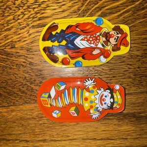 Payaso triste clicker litográfico de hojalata vintage con globos ruidoso hecho en Japón - Imagen 1 de 5
