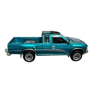 1995 NISSAN HARDBODY DIECSAT MODEL PICKUP TRUCK w/hitch 1:64 SCALE DIORAMA  - Picture 1 of 1