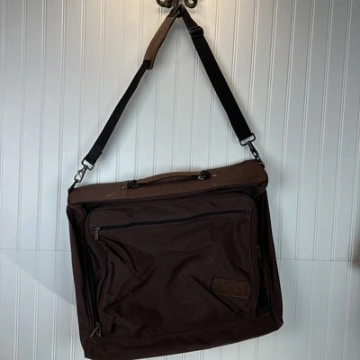 Bolso de viaje Eddie Bauer vintage de lona marrón correas de cuero Foto 1 de 4