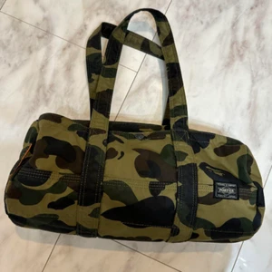 A Bathing Ape x Yoshida PORTER Duffle Bag Green CAMO BAPE Tanker Rare Used Japan - Picture 1 of 4