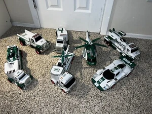 Lotto Camion Hess Elicottero Aereo Hess Auto da Corsa - Foto 1 di 5