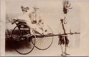 c1910s DURBAN, South Africa RPPC Photo Postcard / British Couple in Ricksha - Picture 1 of 2