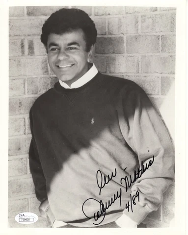 JOHNNY MATHIS HAND SIGNED 8x10 PHOTO         HANDSOME YOUNG POSE        JSA Cover