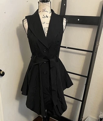 Bebe Negro Sin Mangas Ajuste y Cierre de Botones Acampanado Mujer Trench Talla Pequeña Moderno Foto 1 de 4