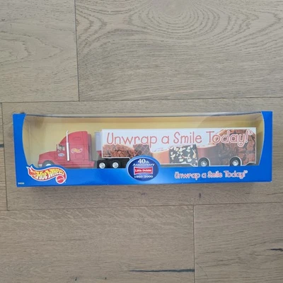 HOT WHEELS LITTLE DEBBIE 40TH ANNIVERSARY UNWRAP A SMILE TODAY TRACTOR TRAILER - Image 1 of 3