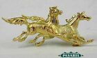 Broche neuve chevaux sauvages or jaune 14 carats