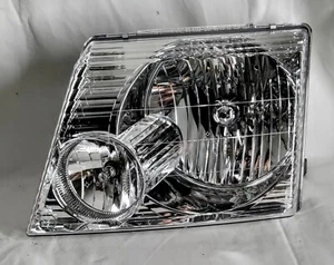 CONJUNTO DE FAROS IZQUIERDOS 02-05 FORD EXPLORER TYC 20-6062-00 NUEVO EN CAJA - Imagen 1 de 2