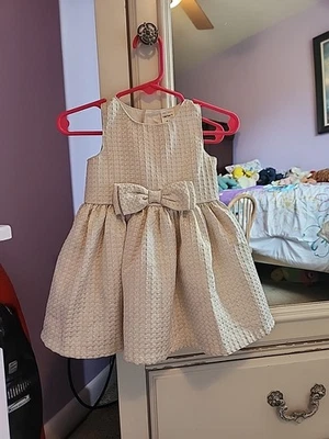 GIRLS GOLD SPARKLE DRESS BY CARTERS.  SZ 6 MONTHS  - Image 1 of 4