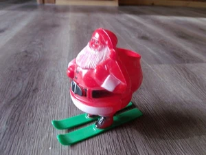 VINTAGE PLASTIC SANTA ON SKIS RED GREEN 4 1/2 INCH TALL #2 - Picture 1 of 3