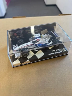 Minichamps 1/43 BMW Sauber F1.08 Robert Kubica 2008 Canada GP Winner Model Car - Image 1 of 4