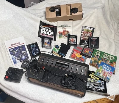 Paquete de consola Atari CX-2600 con juegos, joysticks, paletas y más Foto 1 de 4