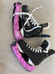 New Listingice hockey skates, barely used, size 3. Bauer Vapour Volt. Includes skate guards