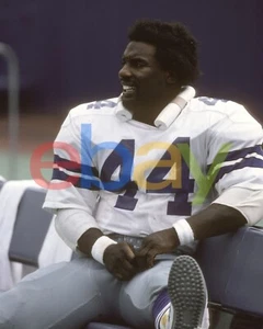 Foto de fútbol americano de la NFL Robert Newhouse descansando en banco Dallas Cowboys 8x10 - Imagen 1 de 1