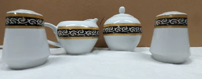 JUEGO DE 4 PLATOS ROYAL SCOTLAND BLANCO+ORO+NEGRO/Crema y Azúcar + Sal y Pimienta. Foto 1 de 4
