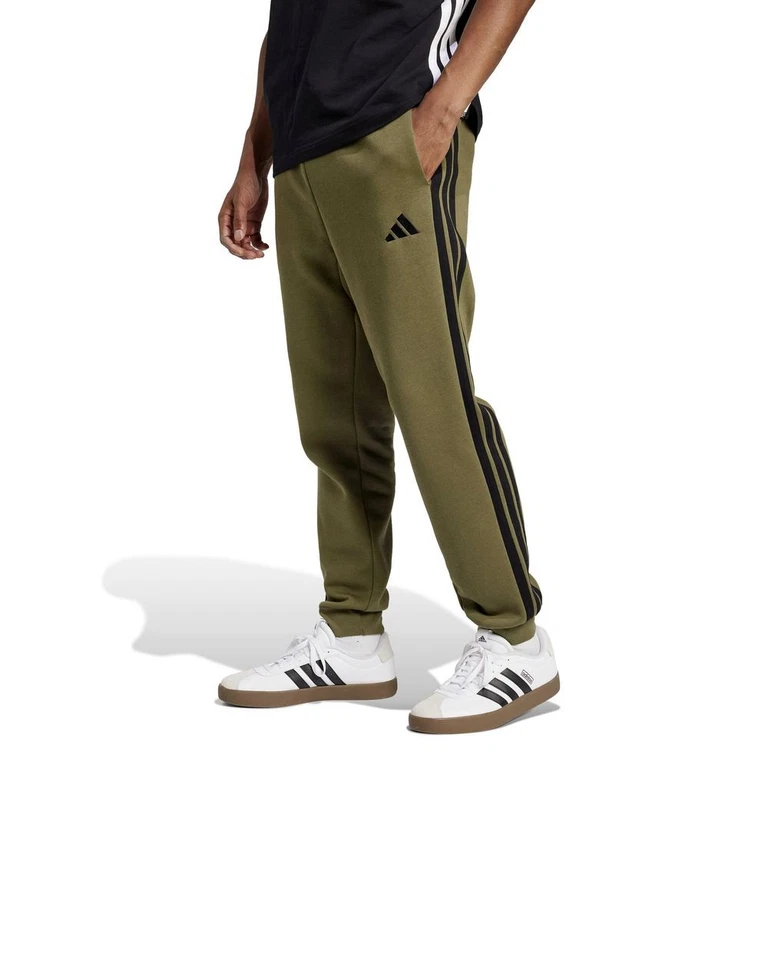  Pantaloni tuta UOMO Adidas Essentials 3-Stripes Fleece Verde oliva Cotone  - Imagen 1 de 4