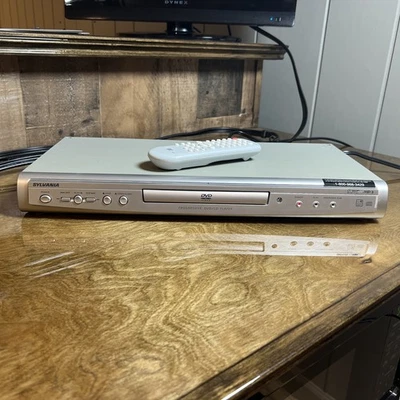 Reproductor de DVD/CD MP3 Sylvania DVL150G progresivo gris probado y funciona. Foto 1 de 4