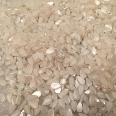 AL657 Vintage Ashley 6x3,5mm "alas de abeja", blanco ónix plástico pera plana (250+) Foto 1 de 2