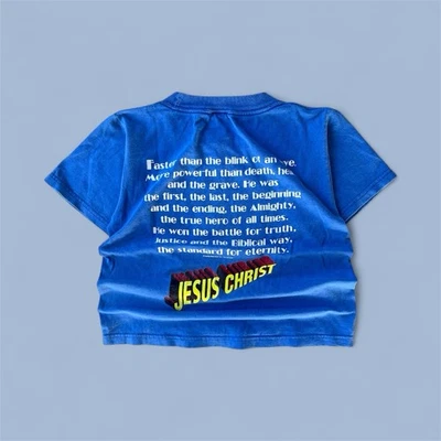 Camiseta Niños Y2K Jesucristo Superhéroe Talla 6/8 XXS Azul/Amarillo Gráfico Camiseta Foto 1 de 4